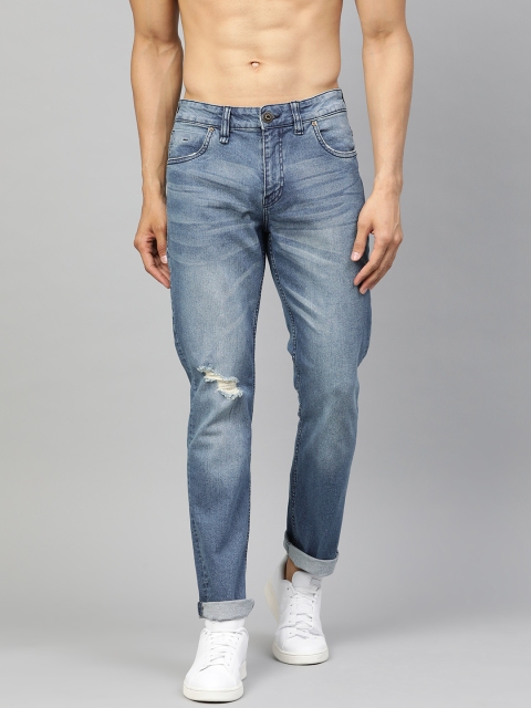 

Roadster Men Blue Slim Tapered Fit Mid-Rise Slash Knee With Low Distress Stretchable Jeans