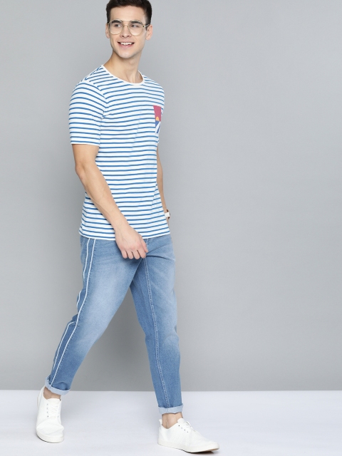 

Mast & Harbour Men Blue Carrot Fit Mid-Rise Clean Look Side Strip Detail Stretchable Jeans