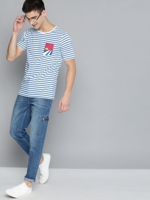 

Mast & Harbour Men Blue Carrot Fit Mid-Rise Clean Look Jeans