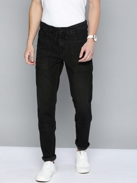 

Mast & Harbour Men Black Carrot Fit Mid-Rise Clean Look Stretchable Jeans