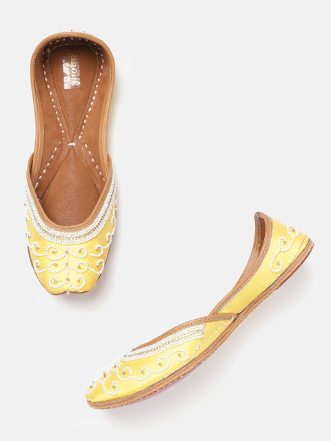 

Anouk Women Yellow & Off-White Embellished Mojaris