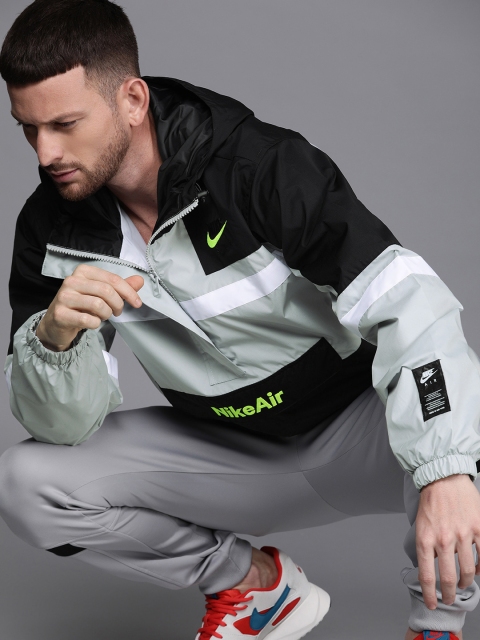 

Nike Men Black Colourblocked Lightweight AIR Woven Sporty Jacket