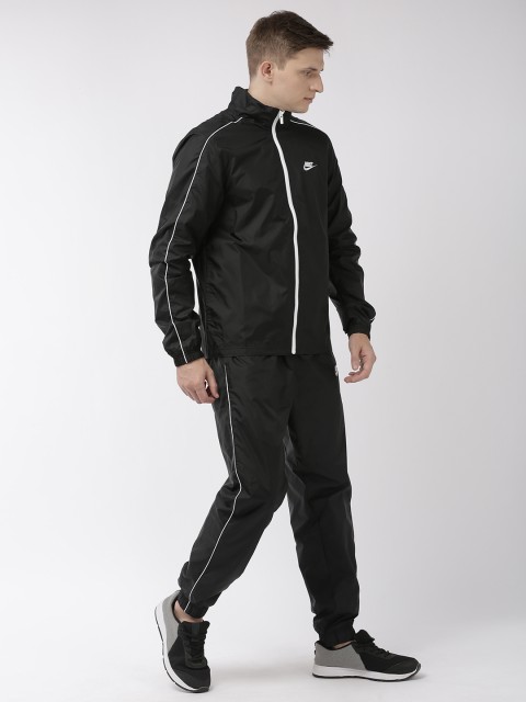 

Nike Men Black Solid Regular Fit Tracksuit