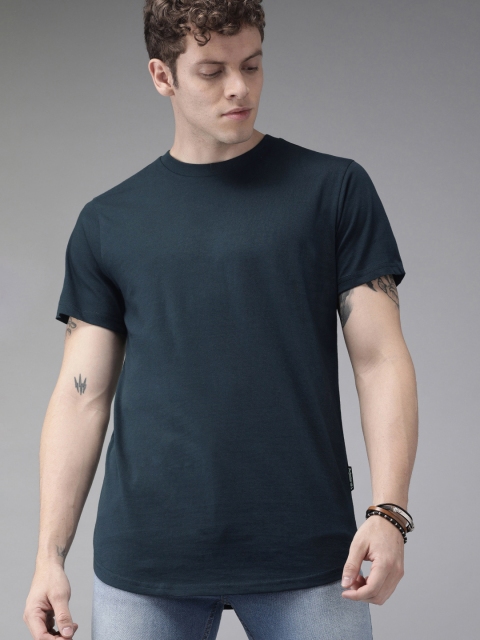 

Roadster Men Navy Blue Solid Round Neck T-shirt With Curved Hem