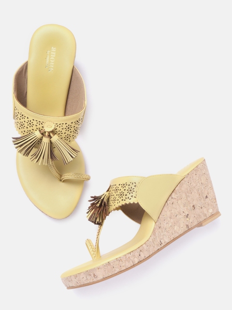 

Anouk Women Yellow Laser Cut Wedges