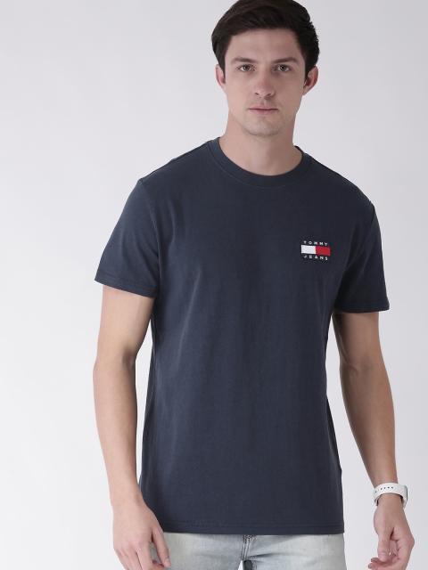 

Tommy Hilfiger Men Navy Blue Solid Round Neck T-shirt With Applique detail