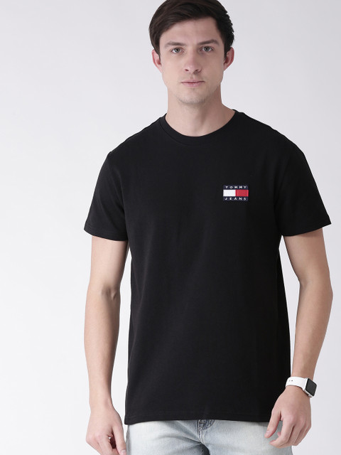 

Tommy Hilfiger Men Black Solid Round Neck T-shirt with Printed Detailing