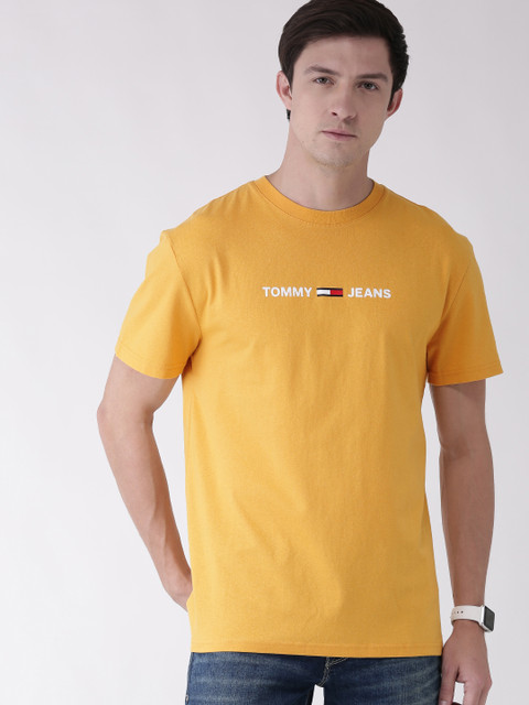 

Tommy Hilfiger Men Yellow Solid Round Neck Pure Cotton T-shirt with Printed Detailing