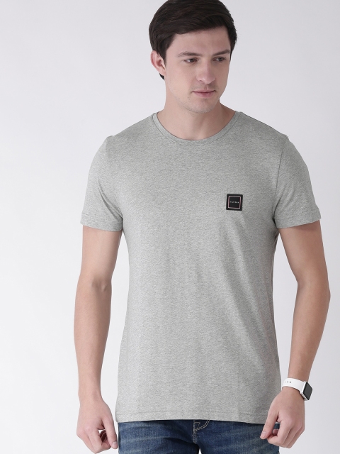 

Tommy Hilfiger Men Grey Solid Round Neck Pure Cotton T-shirt With Applique