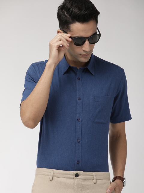 

Indian Terrain Men Blue Slim Fit Solid Smart Casual Shirt