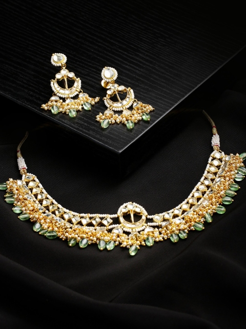 

Justpeachy Gold-Toned & Green Kundan Stone Studded Jewellery Set