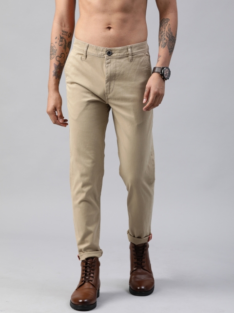 

Roadster Men Beige Tapered Fit Solid Chinos