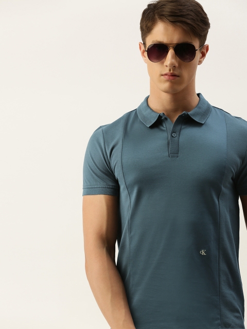 

Calvin Klein Jeans Men Teal Blue Solid Polo Collar T-shirt