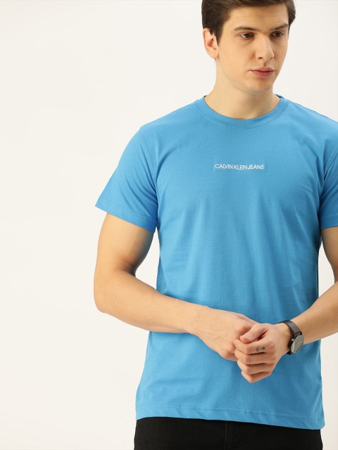 

Calvin Klein Jeans Men Blue Solid Round Neck T-shirt With Embroidered Detailing