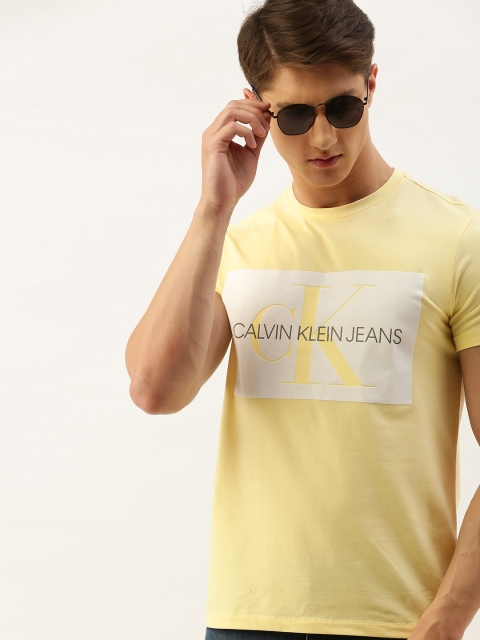 

Calvin Klein Jeans Men Yellow & White Printed Round Neck T-shirt