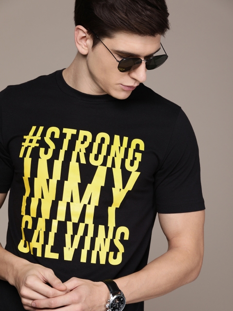 

Calvin Klein Jeans Men Black & Yellow Printed Round Neck T-shirt