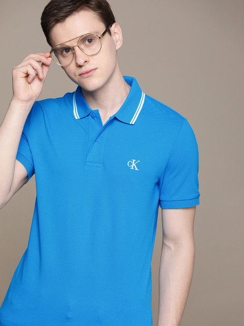 

Calvin Klein Jeans Men Blue Slim Fit Solid Polo Collar T-shirt