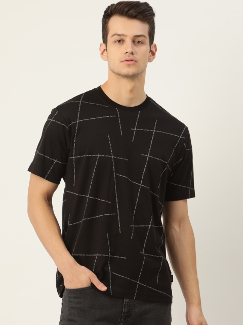 

Calvin Klein Jeans Men Black & White Pure Cotton Printed Round Neck T-shirt