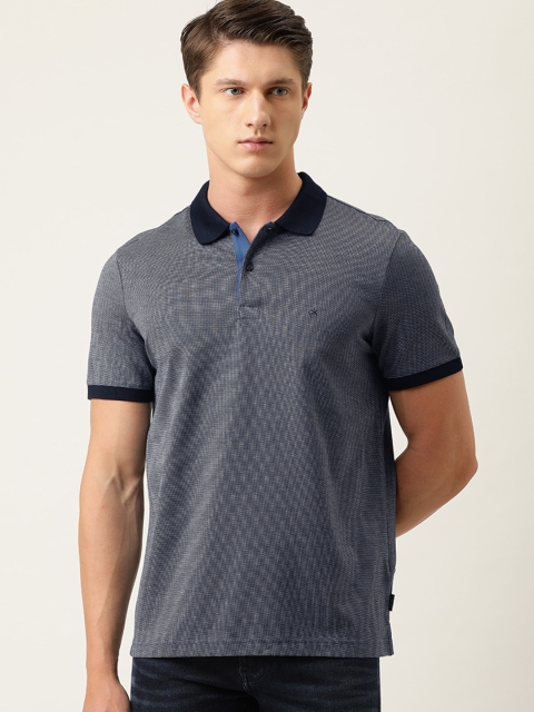 

Calvin Klein Jeans Men Navy Blue Solid Polo Collar T-shirt