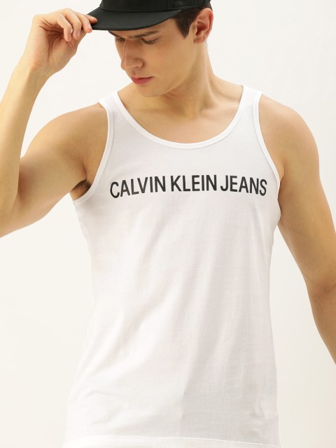 

Calvin Klein Jeans Men White Black Printed Round Neck Pure Cotton T-shirt