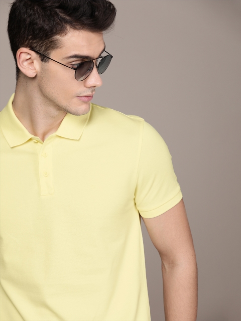 

Calvin Klein Jeans Men Yellow Slim Fit Solid Polo Collar T-shirt
