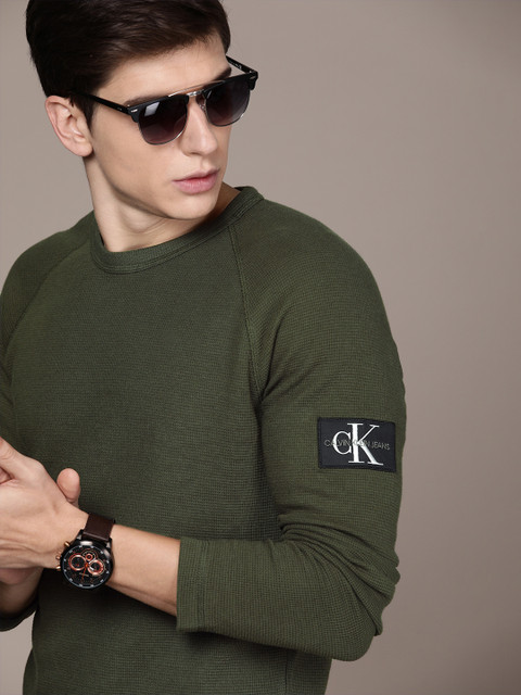 

Calvin Klein Jeans Men Olive Green Slim Fit Self Design Round Neck T-shirt