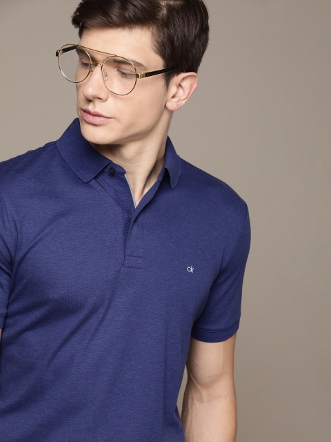 

Calvin Klein Jeans Men Slim Fit Navy Blue Solid Polo Collar T-shirt