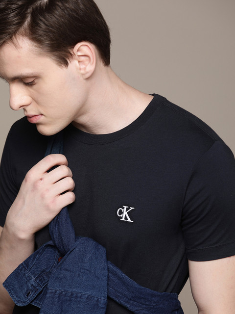 

Calvin Klein Jeans Men Navy Blue Slim Fit Solid Round Neck T-shirt