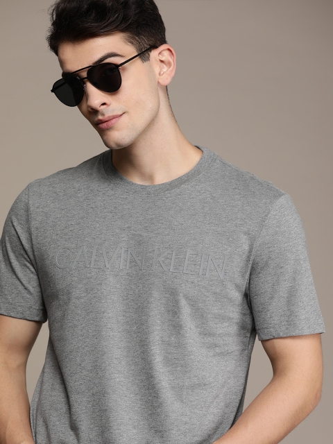 

Calvin Klein Jeans Men Grey Solid Round Neck T-shirt With Rubber Print