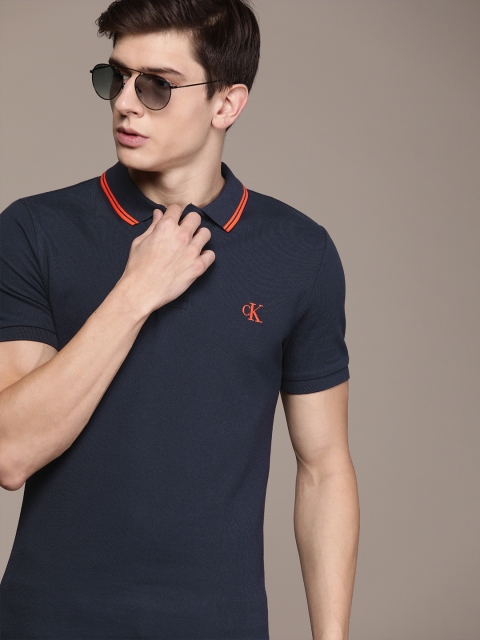 

Calvin Klein Jeans Men Navy Blue Solid Polo Collar T-shirt