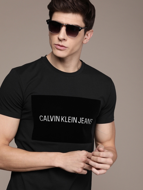 

Calvin Klein Jeans Men Black Embossed Printed Slim Fit Round Neck T-shirt