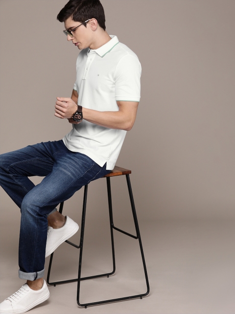 

Calvin Klein Jeans Men White Solid Slim Fit Polo Collar T-shirt