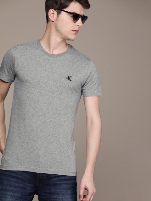 

Calvin Klein Jeans Men Grey Solid Round Neck T-shirt