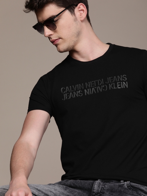 

Calvin Klein Jeans Men Black Slim Fit Solid Round Neck T-shirt with Printed Detailing