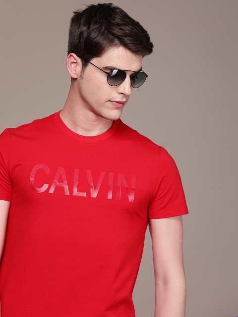 

Calvin Klein Jeans Men Red Printed Slim Fit Round Neck T-shirt