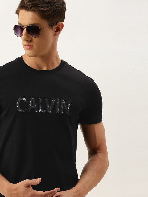 

Calvin Klein Jeans Men Black Self Design Round Neck T-shirt