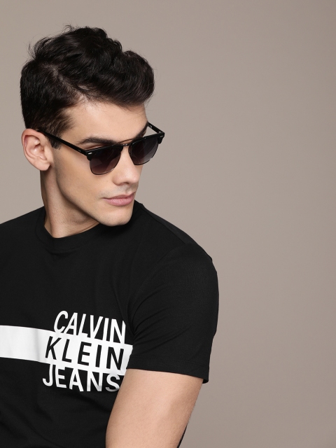 

Calvin Klein Jeans Men Black & White Slim Fit Printed Round Neck T-shirt