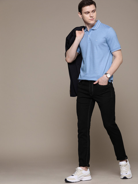 

Calvin Klein Jeans Men Blue Slim Fit Solid Polo Collar T-shirt