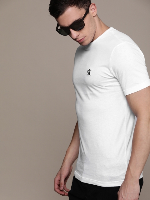 

Calvin Klein Jeans Men White Slim Fit Solid Round Neck Pure Cotton T-shirt