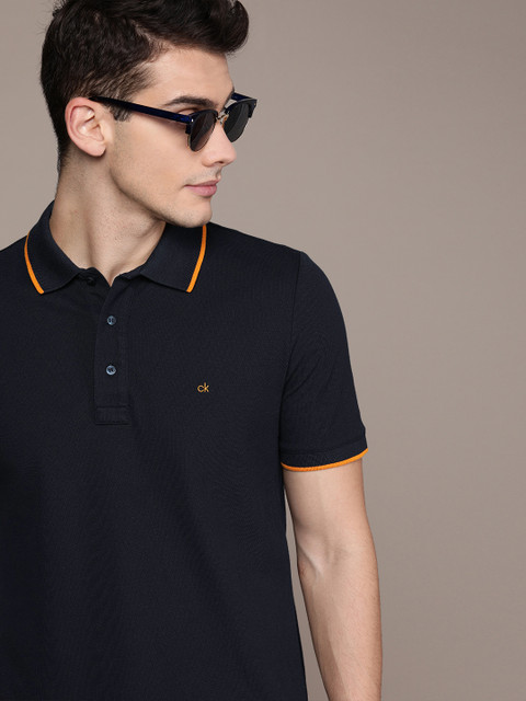 

Calvin Klein Jeans Men Navy Blue Solid Slim Fit Polo Collar T-shirt