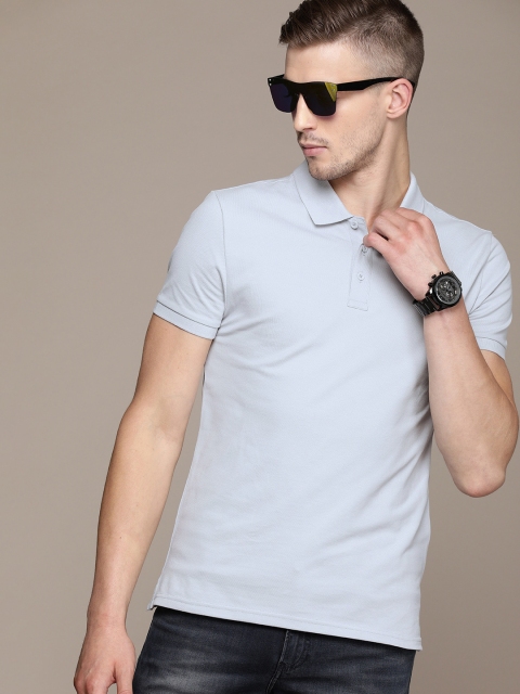 

Calvin Klein Jeans Men Grey Slim Fit Solid Polo Collar T-shirt