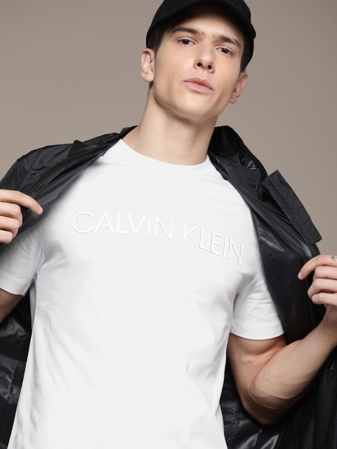 

Calvin Klein Jeans Men White Solid Round Neck T-shirt