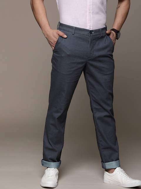 

Calvin Klein Jeans Men Navy Blue Slim Fit Solid Regular Trousers
