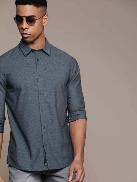

Calvin Klein Jeans Men Blue Self Design Slim Fit Casual Shirt