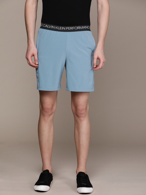 

Calvin Klein Jeans Performance Men Blue Solid Regular Fit Sports Shorts
