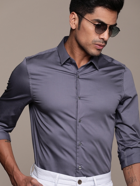 

Calvin Klein Jeans Men Grey Slim Fit Solid Smart Casual Shirt
