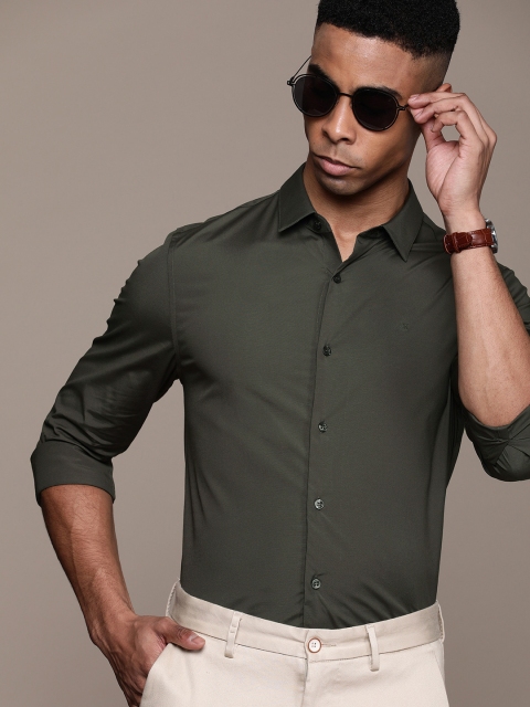 

Calvin Klein Jeans Men Olive Green Slim Fit Solid Smart Casual Shirt