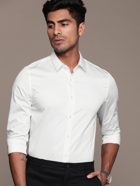 

Calvin Klein Jeans Men White Slim Fit Solid Smart Casual Shirt