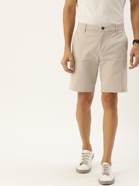 

Calvin Klein Jeans Men Beige Solid Slim Fit Chino Shorts