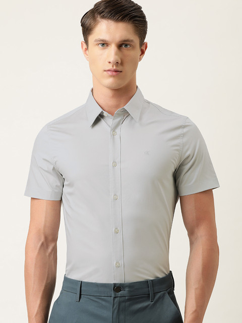 

Calvin Klein Jeans Men Grey Slim Fit Solid Smart Casual Shirt